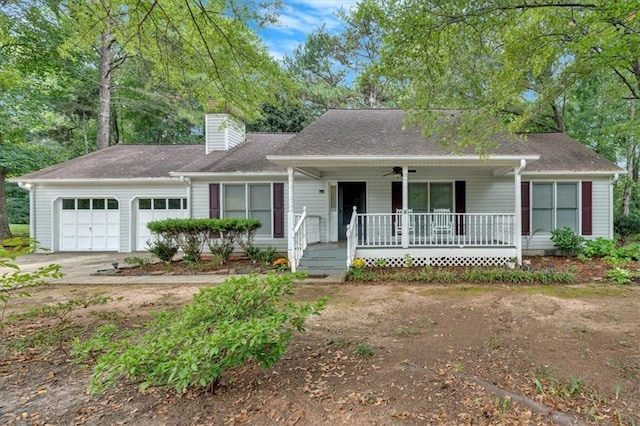 ranch-style home featuring ceiling fan, a garage, and a porch