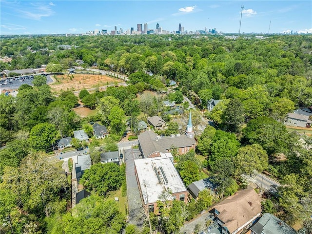 birds eye view of property with a city view