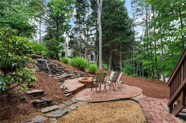 790 Thornberry Dr, Alpharetta, GA 30022 - view of yard with an outdoor fire pit and a patio area