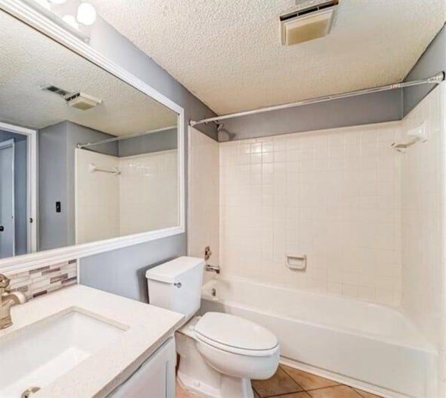 12 Rumson Ct, Smyrna, GA 30080 - bathroom featuring a textured ceiling, tile patterned flooring, tub / shower combination, toilet, and vanity
