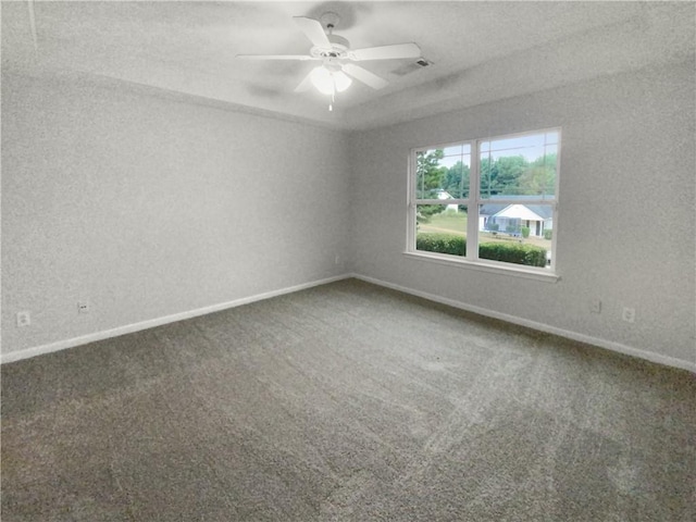 unfurnished room featuring carpet floors and ceiling fan