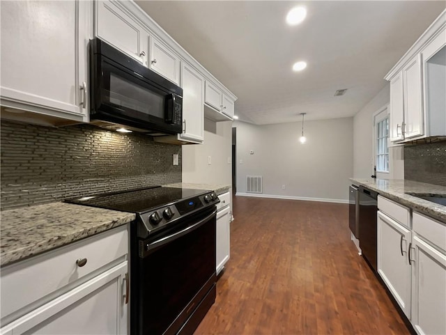 kitchen with white cabinets, pendant lighting, dark wood-type flooring, and black appliances