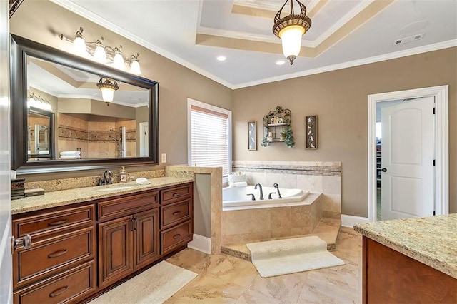 bathroom featuring vanity, a garden tub, tiled shower, a tray ceiling, and crown molding