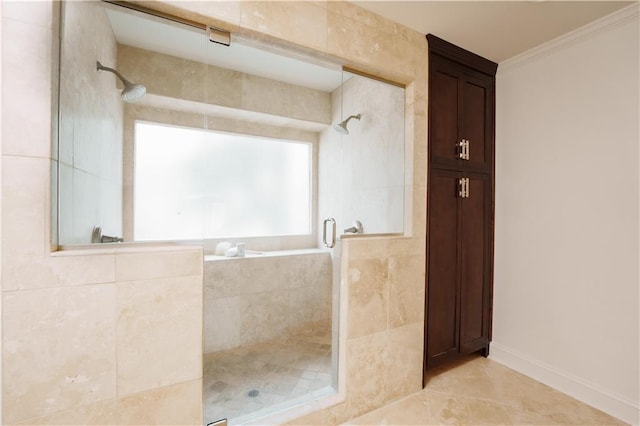 bathroom featuring crown molding, tile patterned floors, and an enclosed shower