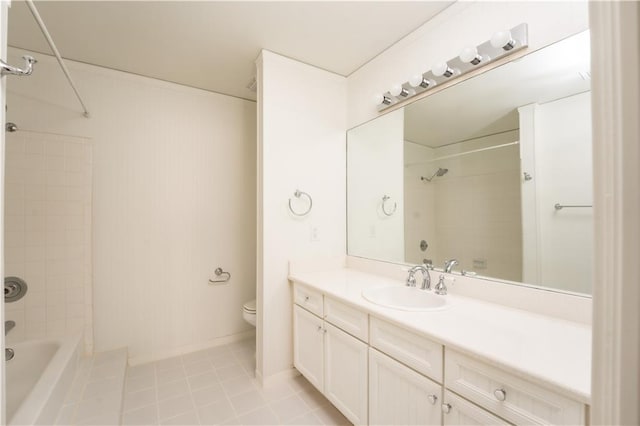 full bathroom with vanity, toilet, tiled shower / bath combo, and tile patterned flooring