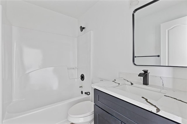 full bathroom featuring vanity, shower / bathtub combination, and toilet