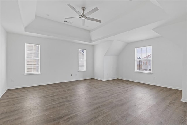 additional living space featuring wood-type flooring and ceiling fan