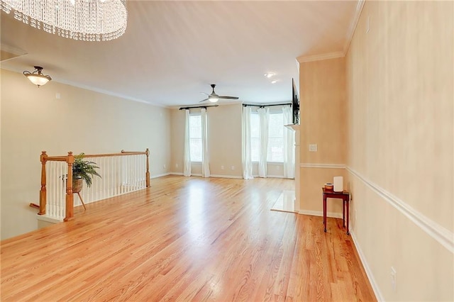 1160 Newpark View Pl Unit 8, Mableton, GA 30126 - spare room with light wood-type flooring, ornamental molding, a chandelier, and ceiling fan