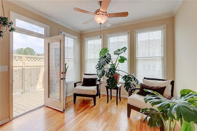1160 Newpark View Pl Unit 8, Mableton, GA 30126 - living area featuring light wood finished floors, ornamental molding, and a ceiling fan