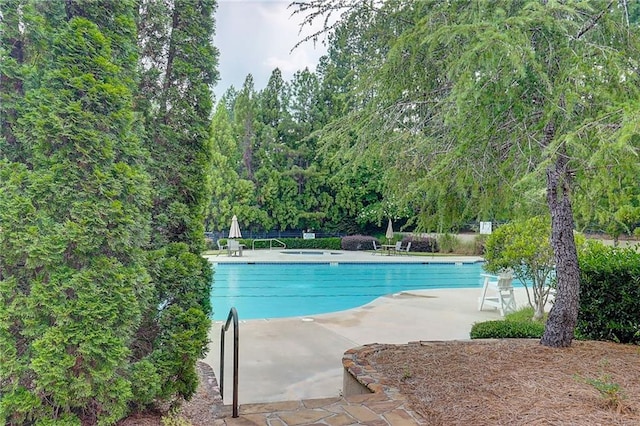 1160 Newpark View Pl Unit 8, Mableton, GA 30126 - community pool featuring a patio area