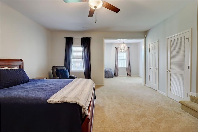 1160 Newpark View Pl Unit 8, Mableton, GA 30126 - bedroom with carpet floors, two closets, and ceiling fan