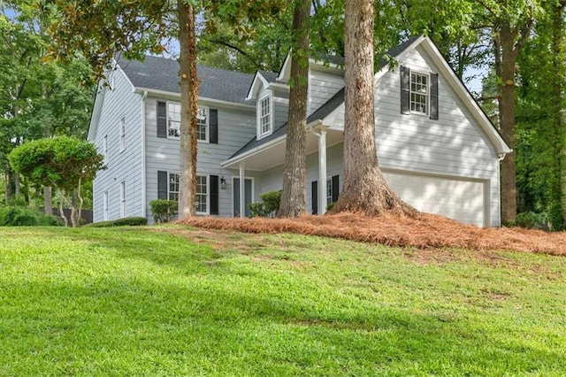 1420 Fieldgreen Overlook, Stone Mountain, GA 30088 - view of front facade with a front yard and an attached garage