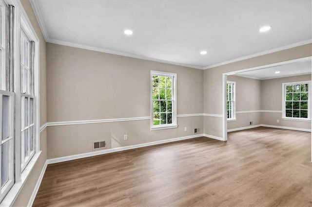 1420 Fieldgreen Overlook, Stone Mountain, GA 30088 - unfurnished room with wood finished floors, healthy amount of natural light, ornamental molding, and recessed lighting