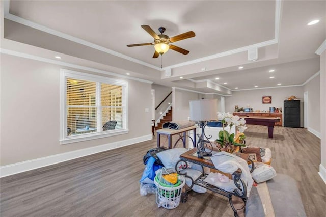 dining area with a tray ceiling, ceiling fan, billiards, and ornamental molding