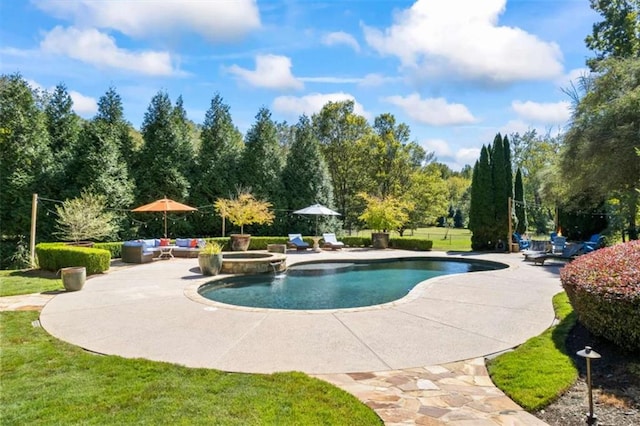 view of pool featuring an in ground hot tub, a yard, an outdoor hangout area, and a patio area