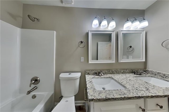 full bathroom featuring vanity, toilet, and bathing tub / shower combination