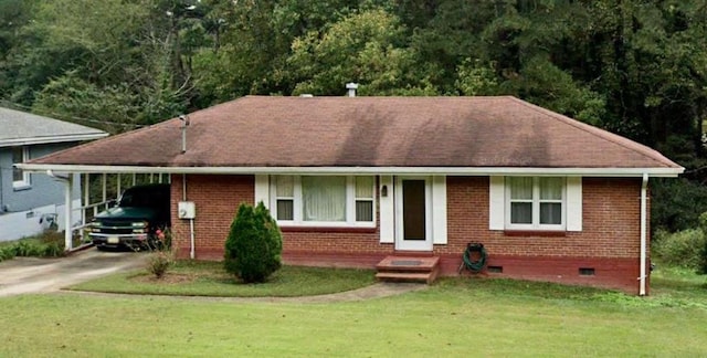 ranch-style house featuring brick siding, concrete driveway, crawl space, a carport, and a front lawn