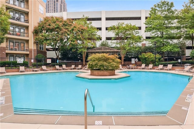 view of swimming pool with a gazebo