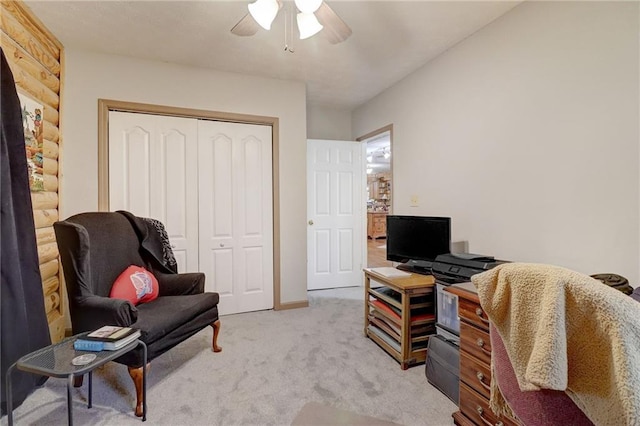 office with ceiling fan and light carpet