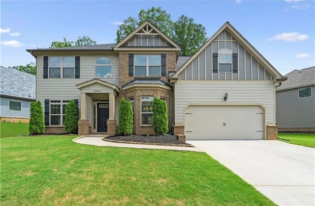 craftsman inspired home with a front yard and a garage