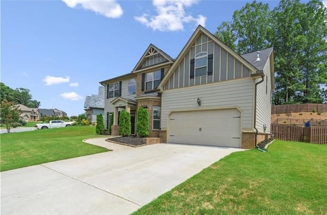 craftsman-style home with a garage and a front lawn