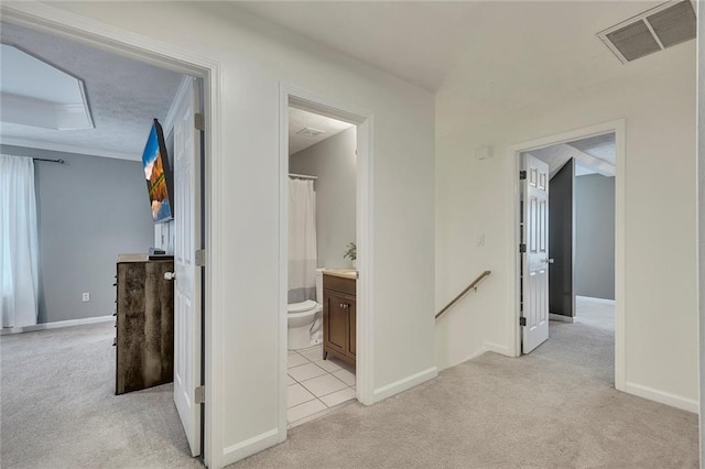 5407 Palmetto Ct, Flowery Branch, GA 30542 - hall with an upstairs landing, light carpet, baseboards, and light tile patterned flooring