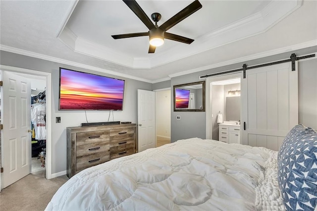 5407 Palmetto Ct, Flowery Branch, GA 30542 - carpeted bedroom with a tray ceiling, a barn door, ornamental molding, baseboards, and ceiling fan