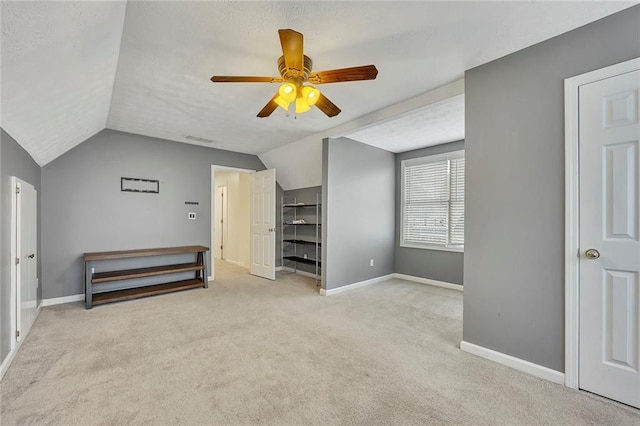 5407 Palmetto Ct, Flowery Branch, GA 30542 - unfurnished bedroom featuring carpet floors, lofted ceiling, baseboards, and ceiling fan