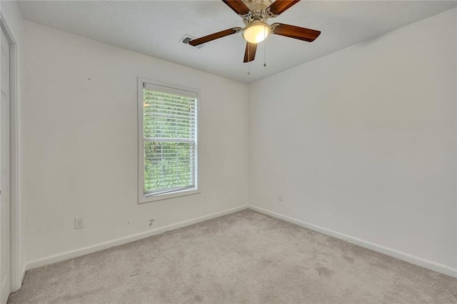 5407 Palmetto Ct, Flowery Branch, GA 30542 - spare room with light colored carpet, baseboards, and ceiling fan