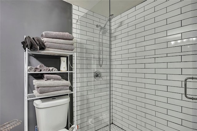 5407 Palmetto Ct, Flowery Branch, GA 30542 - bathroom featuring a shower stall and toilet