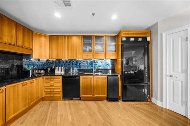2881 Peachtree Rd NE Unit 1102, Atlanta, GA 30305 - kitchen with fridge, a sink, black dishwasher, light wood-style floors, and recessed lighting