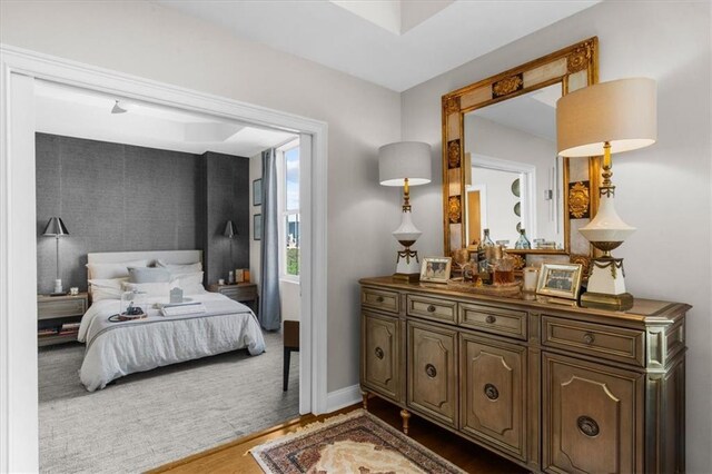 2881 Peachtree Rd NE Unit 1102, Atlanta, GA 30305 - bedroom with wood finished floors and baseboards