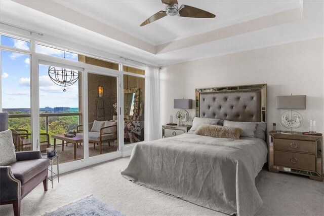 2881 Peachtree Rd NE Unit 1102, Atlanta, GA 30305 - carpeted bedroom with access to outside, ornamental molding, a ceiling fan, and a tray ceiling
