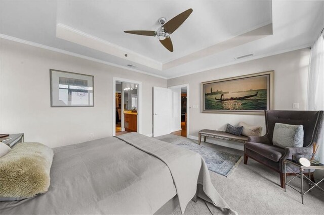 2881 Peachtree Rd NE Unit 1102, Atlanta, GA 30305 - carpeted bedroom featuring a tray ceiling, crown molding, ceiling fan, and ensuite bathroom