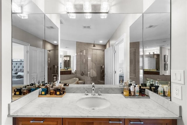 2881 Peachtree Rd NE Unit 1102, Atlanta, GA 30305 - bathroom featuring a shower stall and vanity