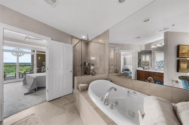2881 Peachtree Rd NE Unit 1102, Atlanta, GA 30305 - full bathroom featuring a shower stall, a jetted tub, ensuite bathroom, vanity, and recessed lighting