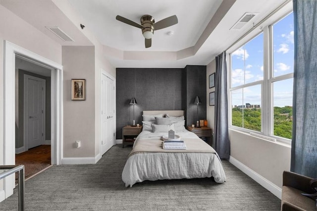 2881 Peachtree Rd NE Unit 1102, Atlanta, GA 30305 - bedroom with baseboards, carpet, and ceiling fan