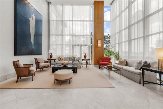 2881 Peachtree Rd NE Unit 1102, Atlanta, GA 30305 - building lobby with a wall of windows and a towering ceiling