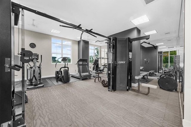 2881 Peachtree Rd NE Unit 1102, Atlanta, GA 30305 - workout area featuring healthy amount of natural light, baseboards, and carpet flooring