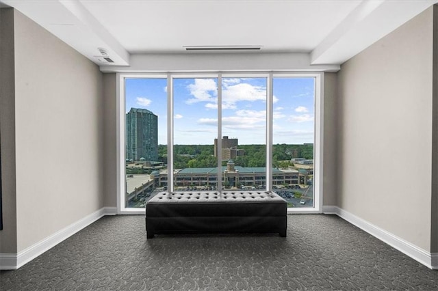 2881 Peachtree Rd NE Unit 1102, Atlanta, GA 30305 - sitting room featuring dark colored carpet and baseboards