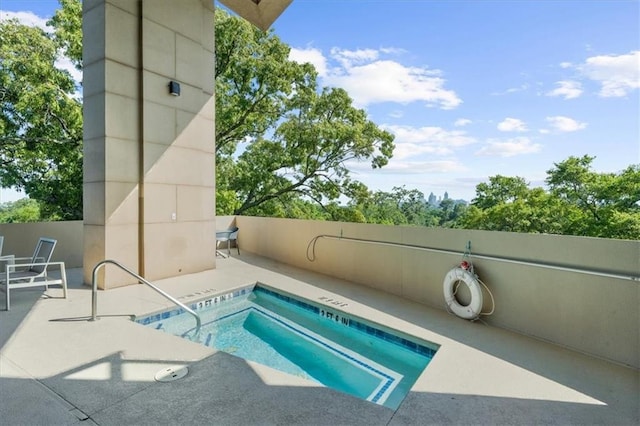 2881 Peachtree Rd NE Unit 1102, Atlanta, GA 30305 - view of pool featuring a hot tub and a patio area