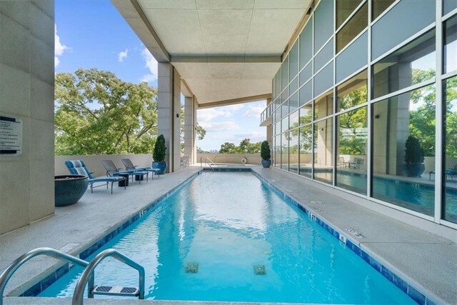 2881 Peachtree Rd NE Unit 1102, Atlanta, GA 30305 - community pool featuring a patio area