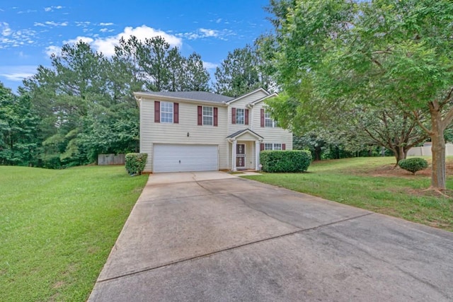7459 Old Chapel, South Fulton, GA 30349 - traditional-style house featuring an attached garage, concrete driveway, and a front lawn