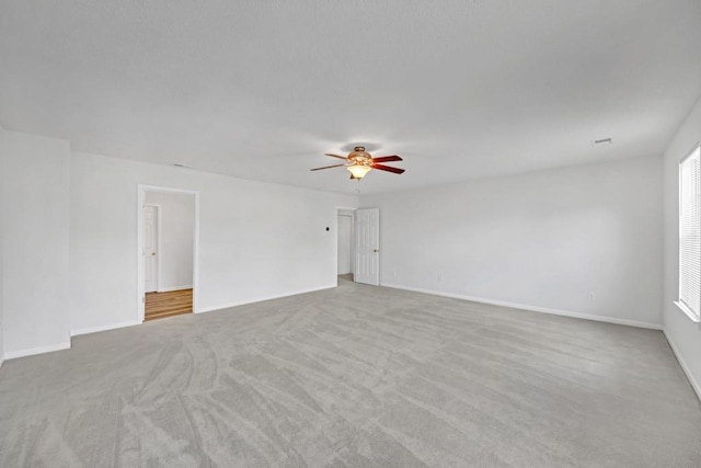 7459 Old Chapel, South Fulton, GA 30349 - empty room featuring ceiling fan, carpet, and baseboards