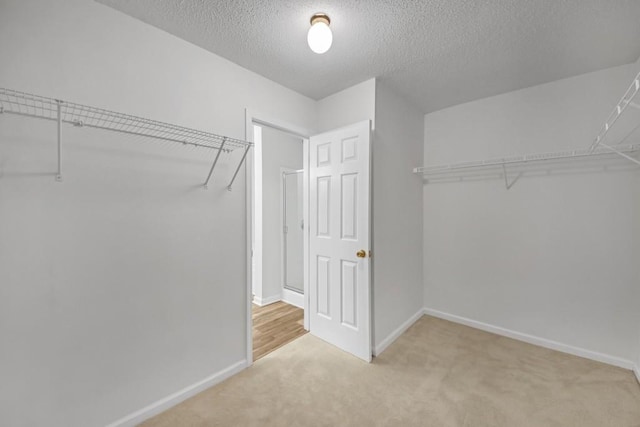 7459 Old Chapel, South Fulton, GA 30349 - walk in closet with carpet floors