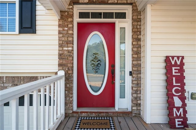 view of exterior entry with stone siding