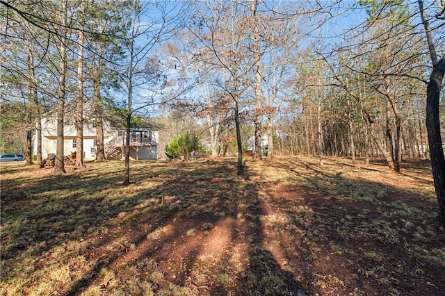 view of yard featuring stairs