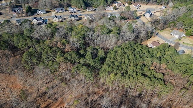 drone / aerial view with a forest view