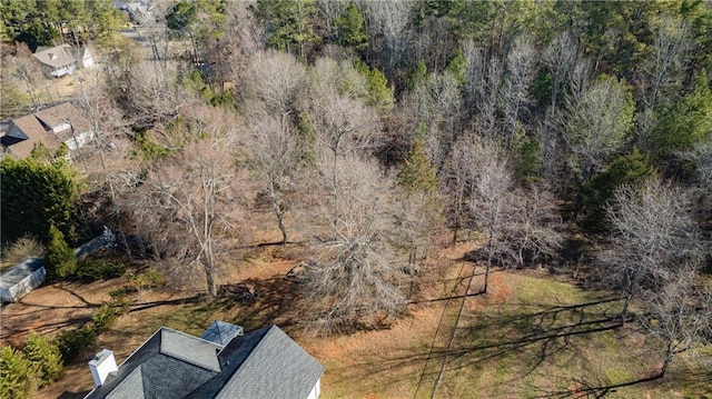 bird's eye view featuring a view of trees