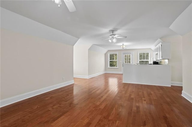 12 Rosalyn Rd, Georgetown, GA 39854 - unfurnished living room with ceiling fan, wood finished floors, baseboards, and lofted ceiling